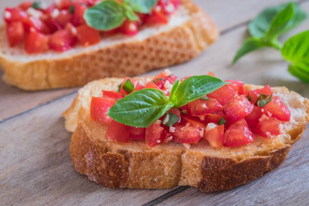 istock Bruschetta with chopped tomato and basil on toast 1006041414