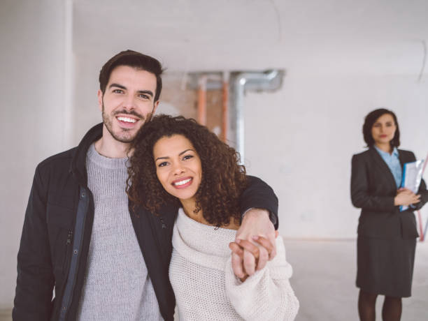 istock Couple buying new home 1006055224