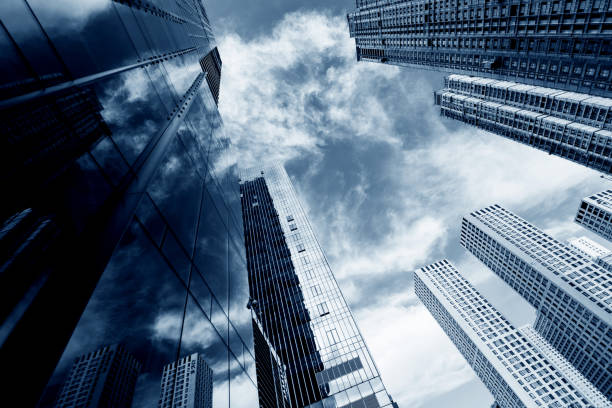 istock Looking up of modern office buildings 1006063036