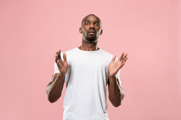istock The young attractive man looking suprised 1006070894