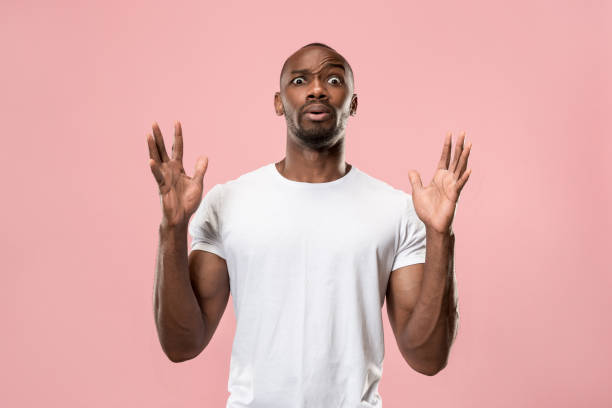 istock The young attractive man looking suprised 1006071244
