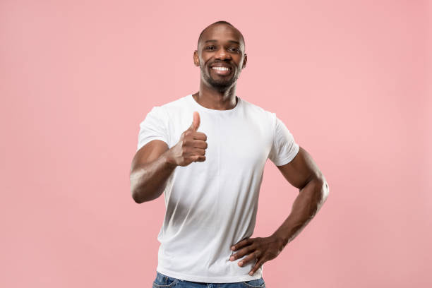 istock The happy businessman standing and smiling 1006073810