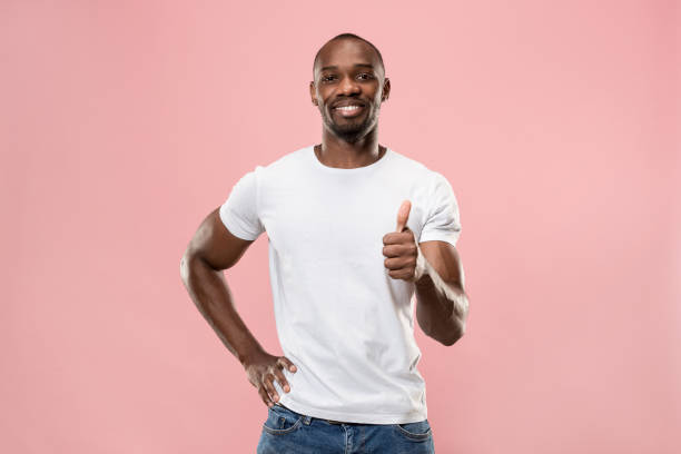 istock The happy businessman standing and smiling 1006073874