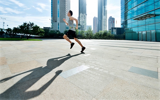 Man running in city street