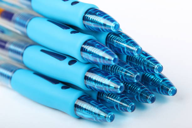 istock Group of ten blue plastic gel pens on a white background 1006078424