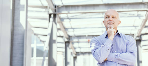 istock Low angle view of senior man 1006078482