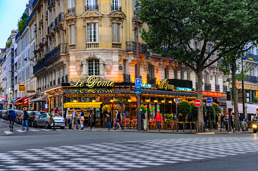 Paris, France - circa May, 2017: The cafe Le Dome is the famous cafe in the Montparnasse quarter of Paris.It had been frequented by Pablo Picasso, Amadeo Modigliani, Wassilii Kandinsky