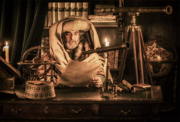 Astronomer reading ancient document Astronomer reading ancient document astronomer photos stock pictures, royalty-free photos & images