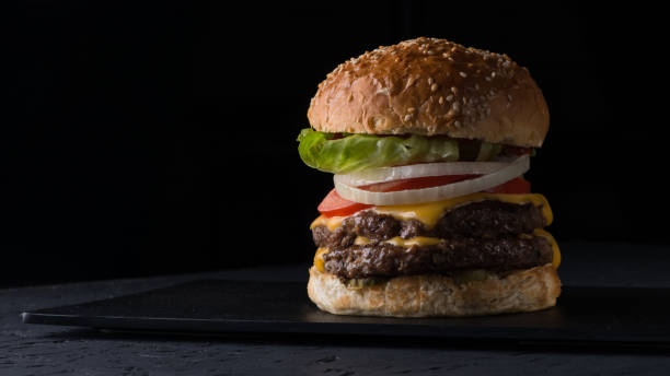 istock fast food on a black background 1006089380