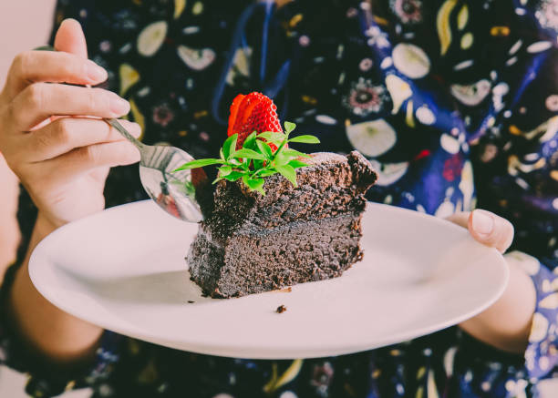 istock Chocolate cake with strawberry fruit topping. 1006092148