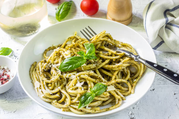 istock Spaghetti with homemade pesto sauce 1006098722