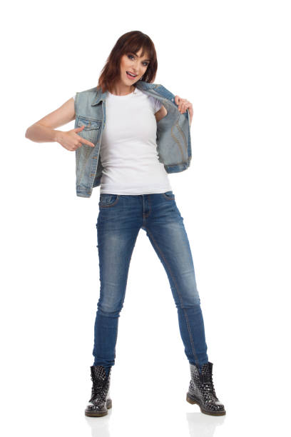 istock Woman In Unbuttoned Jeans Jacket Is Pointing At Herself 1006101516
