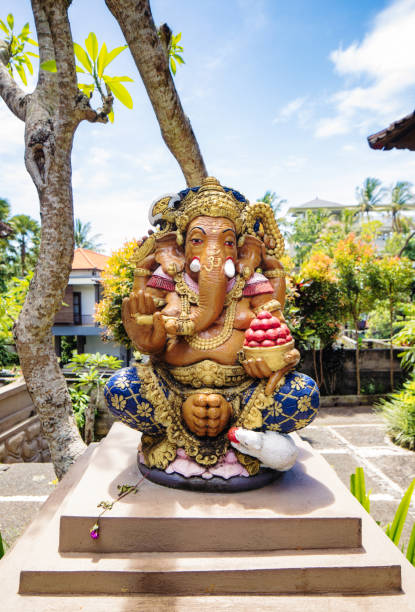 Ganesha statue in Ubud Bali Indonesia, erected on a sidewalk by holiday villas