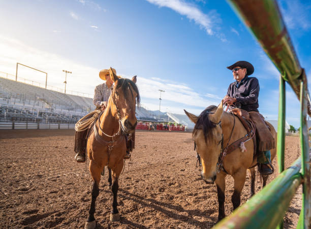 istock Cowboys at rodeo arena 1006103096