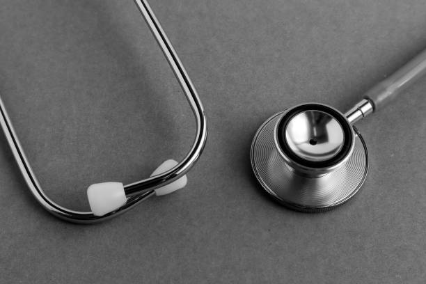 istock Medical equipments including stethoscope medicines background, top view flat lay 1006118714