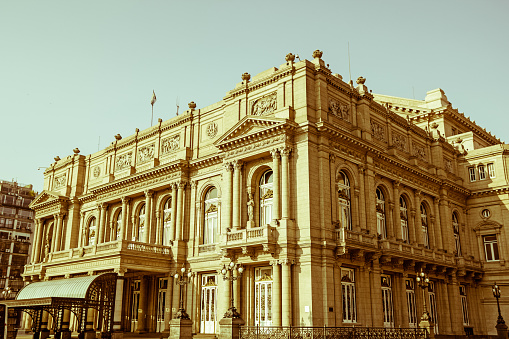 Colon Theatre facade on 9 de julio Avenue at Buenos Aires, Argentina. Vintage and yesteryear effect