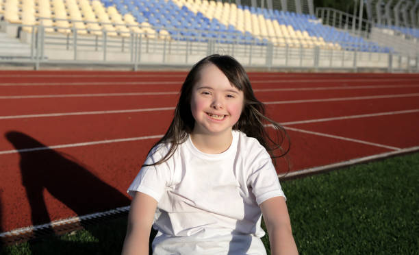 istock Little girl have fun on the stadium 1006129466