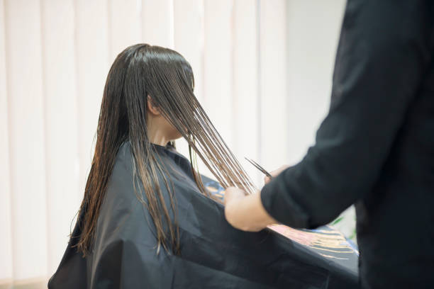 istock Cutting woman's hair 1006129804