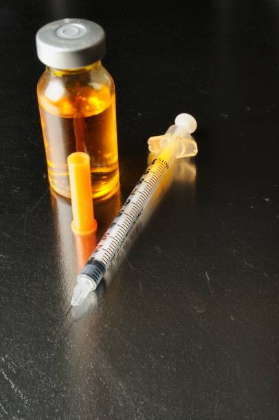 istock Medicine vial with syringe 1006139956