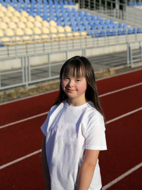 istock Little girl have fun on the stadium 1006142364
