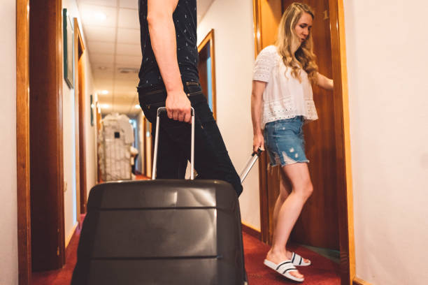 istock Couple arrived to their hotel room 1006151006