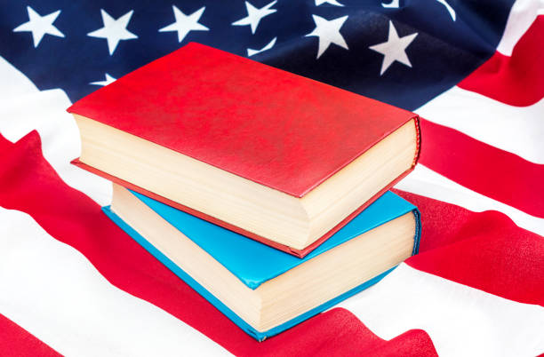 istock Books on american flag. American education concept. 1006151896