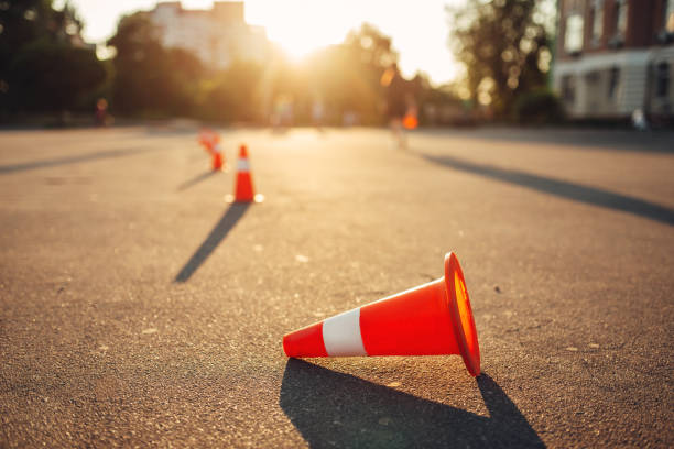 fallen cone on training ground, driving school - driving training car safety imagens e fotografias de stock