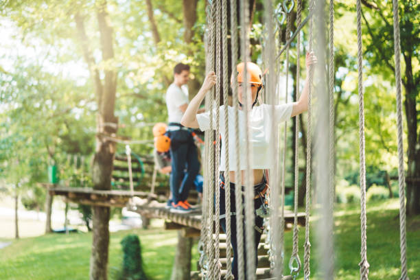 istock Having fun on a beautiful day in adventure park 1006164964
