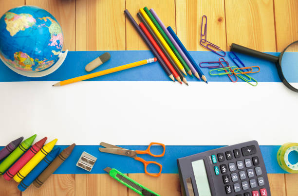School supplies on wooden background,flat lay