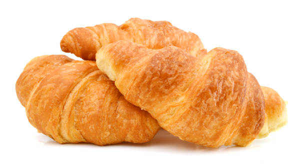 istock Fresh and tasty croissant over white background 1006190562