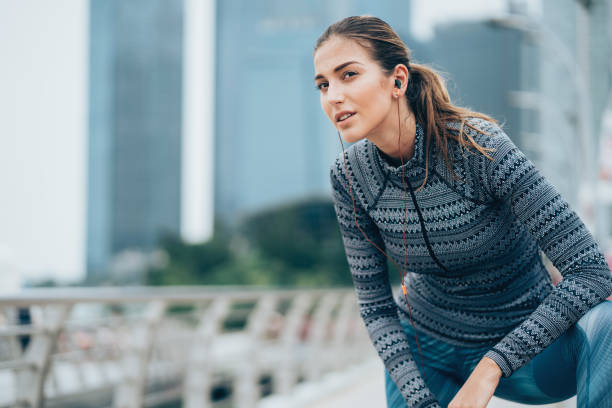 istock Young sportswoman taking breath 1006197208