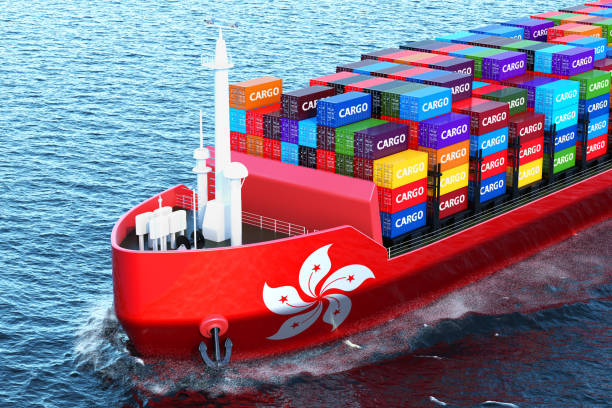 istock Hong Kong freighter ship with cargo containers sailing in ocean, 3D rendering 1006208188