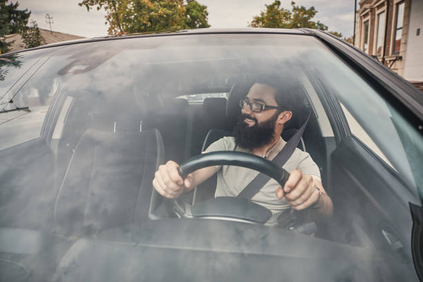 istock A modern bearded man driving a car 1006208854