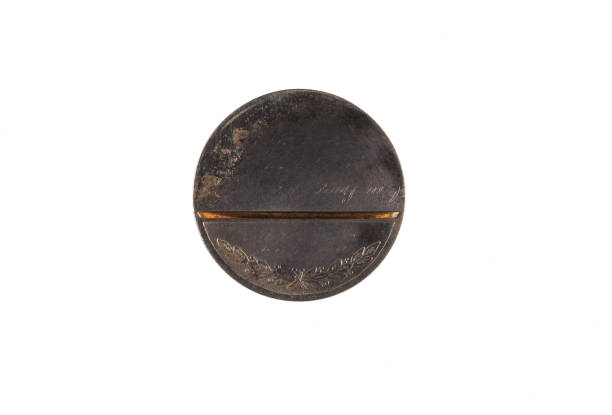 istock old coin, metallic sign on a white background 1006213056
