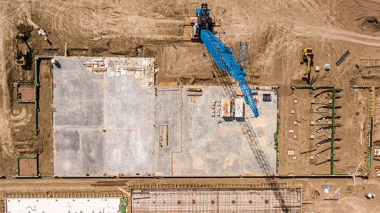 Aerial view of foundation of building with concrete work
