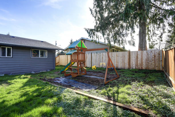 istock Grey rambler with kids playground in the back yard. 1006223330