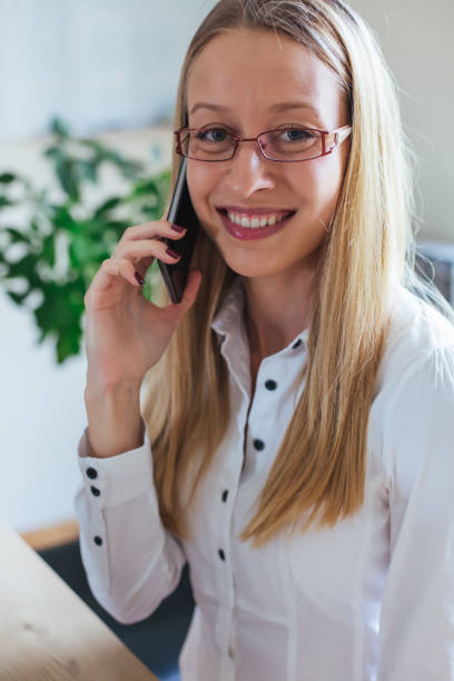 istock Businesswoman Talking on Cell Phone 1006229030