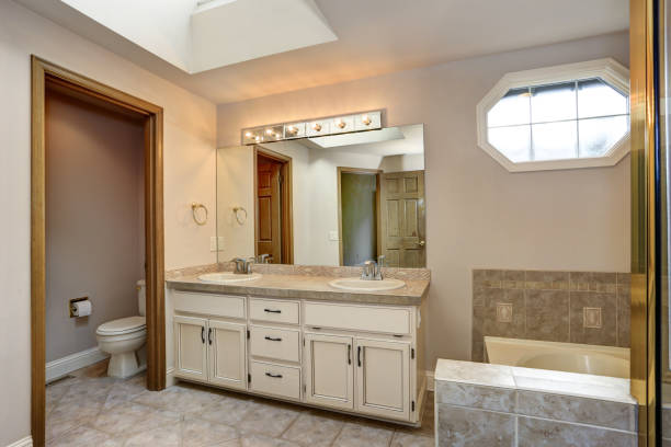 istock Master Bathroom with double vanity cabinet and shower. 1006232388