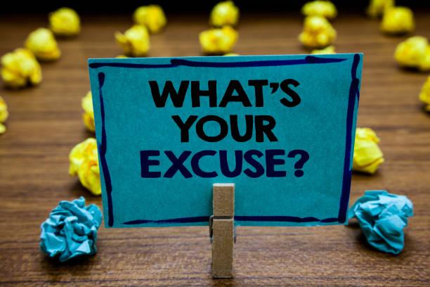 istock Handwriting text What s is Your Excuse question. Concept meaning Explanations for not doing something Inquiry Blurry wooden deck yellow and blue lob on ground paper clip grip page with text. 1006243562