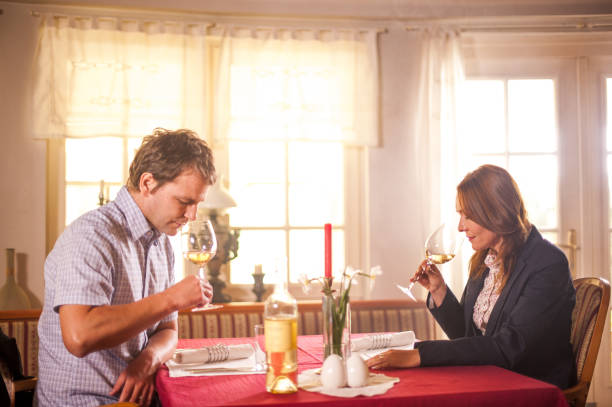 istock Young Couple Having a Romantic Dinner in Restaurant 1006243864