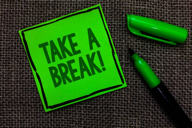 istock Writing note showing Take A Break. Business photo showcasing Resting Stop doing something recreation time get out of work Black lined green sticky note with words open green pen on sack. 1006247270
