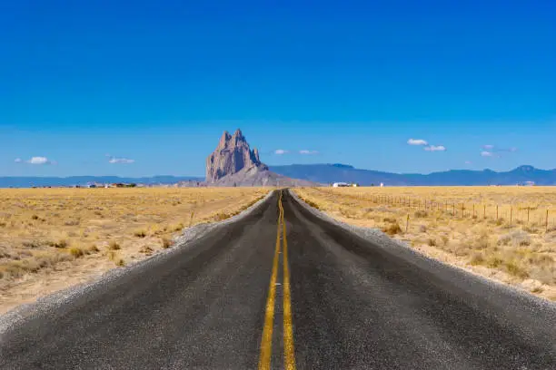 Desert highway leading to Shiprock in the New Mexico desert.