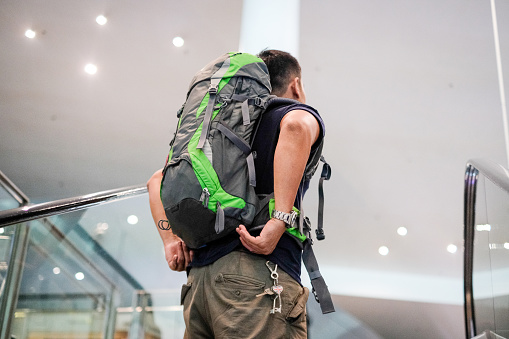 Man alone travel with backpack