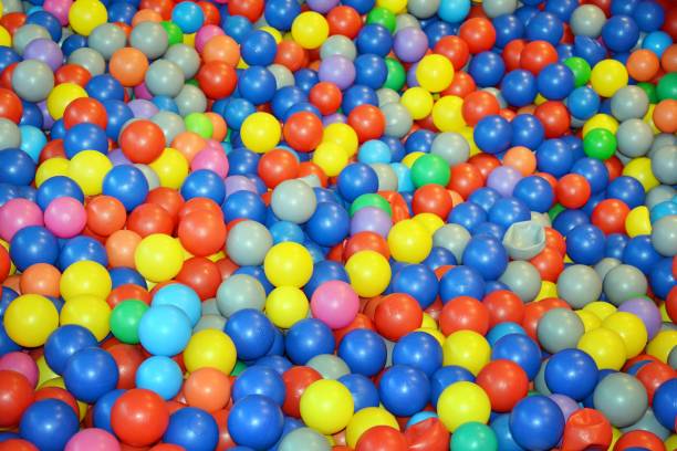istock Color plastic balls on children's playground 1006266084