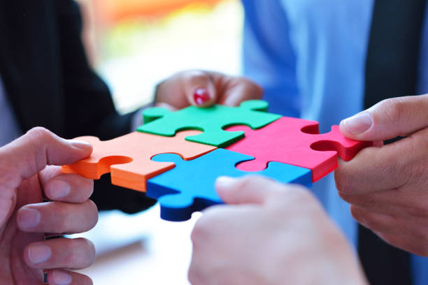 istock Business Connection Corporate Team Jigsaw Puzzle Concept 1006266144