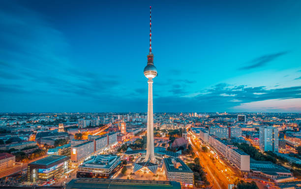 istock Berlin skyline panorama with famous TV tower at Alexanderplatz at night, Germany 1006268366