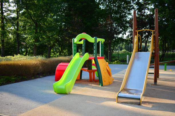 istock Colorful playground on yard in the park. 1006268382