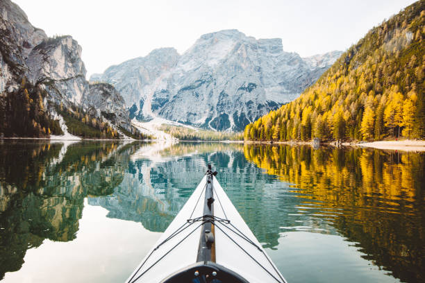 istock Kayak on a lake with mountains in the Alps 1006268630