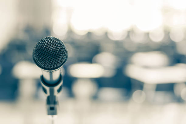 istock Microphone speaker in school lecture hall, seminar meeting room or educational business conference event for host, teacher or coaching mentor 1006276734
