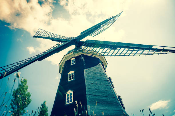 Wheat windmill. Harvest concent. The Stock Photo.
